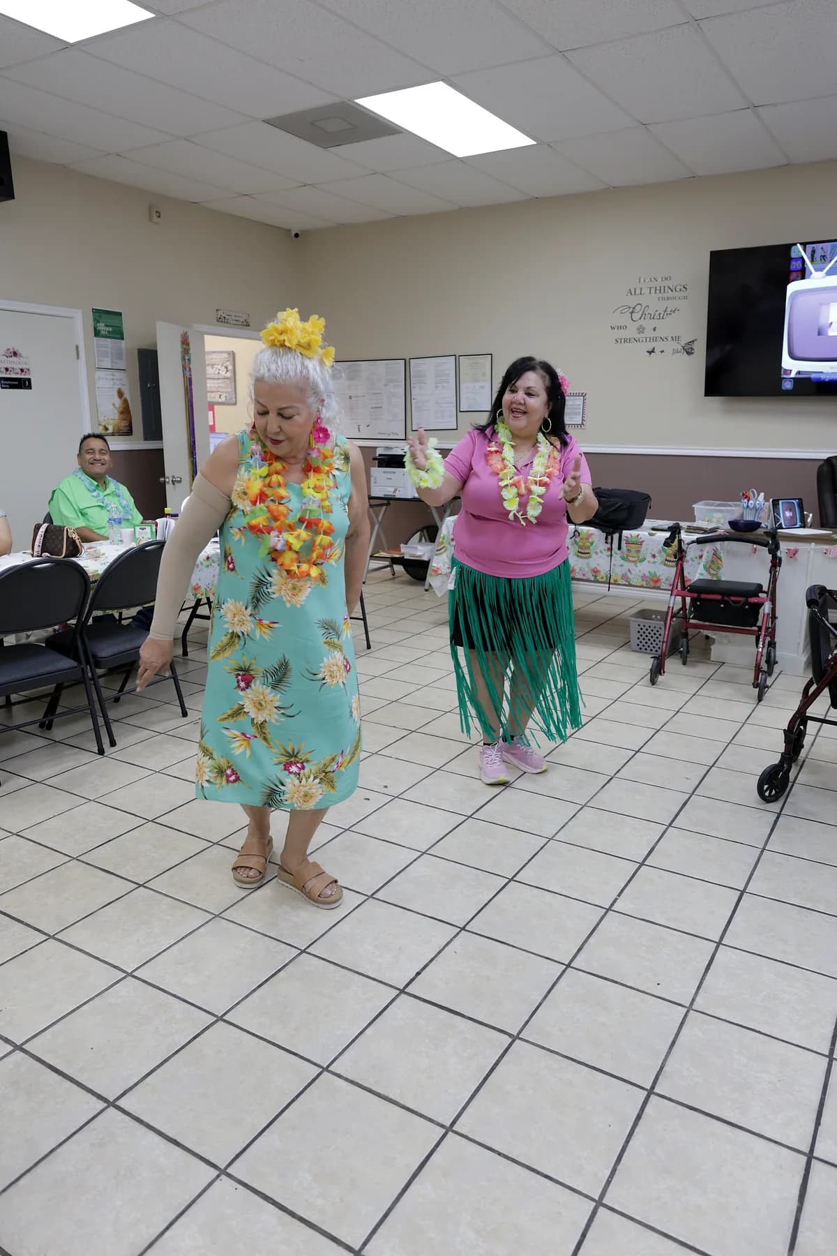 A participant dancing and laughing during the afternoon