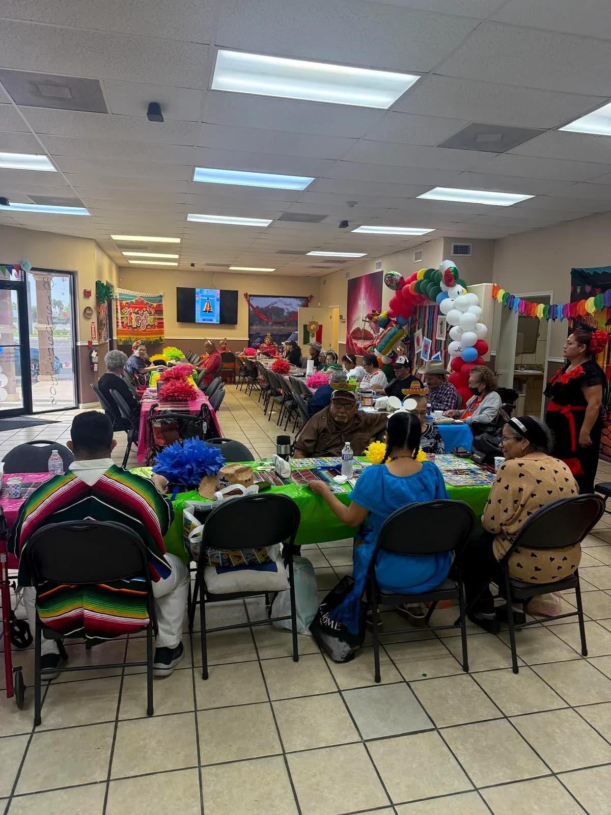 The activity room full for the grand opening celebration